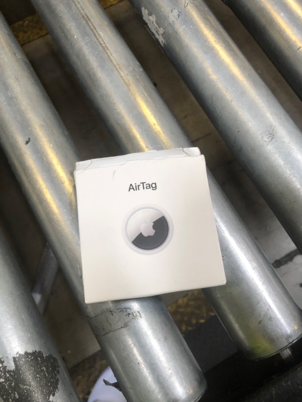 Photo 1 of Apple AirTag. Keep Track of and find Your Keys, Wallet, Luggage, Backpack, and More. Simple one-tap Set up with iPhone or iPad