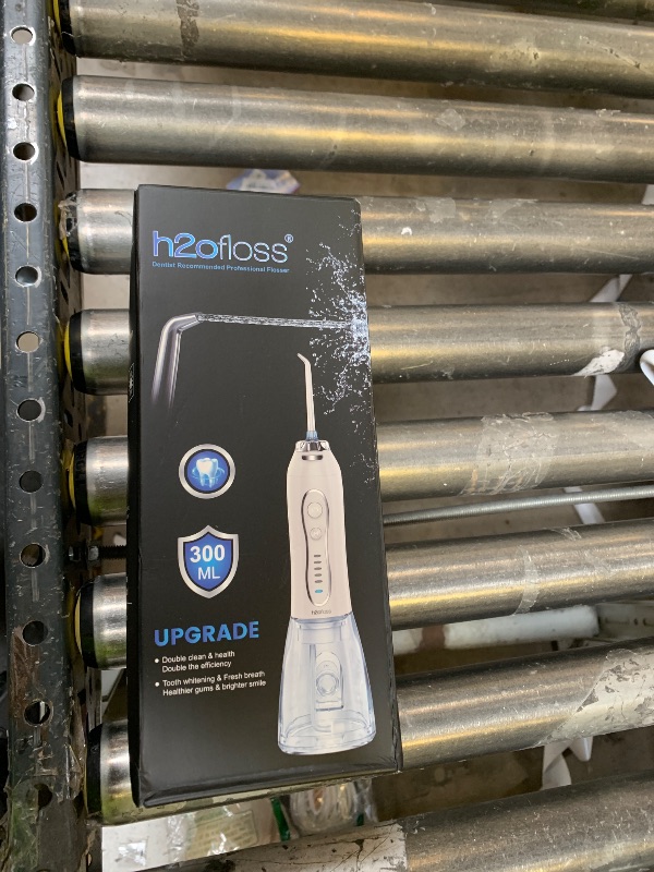 Photo 1 of H2ofloss Water Dental Flosser Portable Dental Oral Irrigator with 5 Modes, 6 Replaceable Jet Tips, Rechargeable IPX7 Waterproof Teeth Cleaner for Home and Travel -300ml Detachable Reservoir (HF-6)