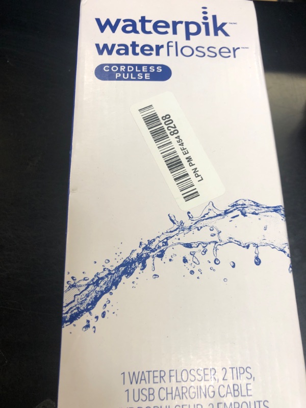 Photo 1 of Waterpik Cordless Pulse Rechargeable Portable Water Flosser for Teeth, Gums, Braces Care and Travel with 2 Flossing Tips, Waterproof, ADA Accepted, WF-20 White, Packaging May Vary