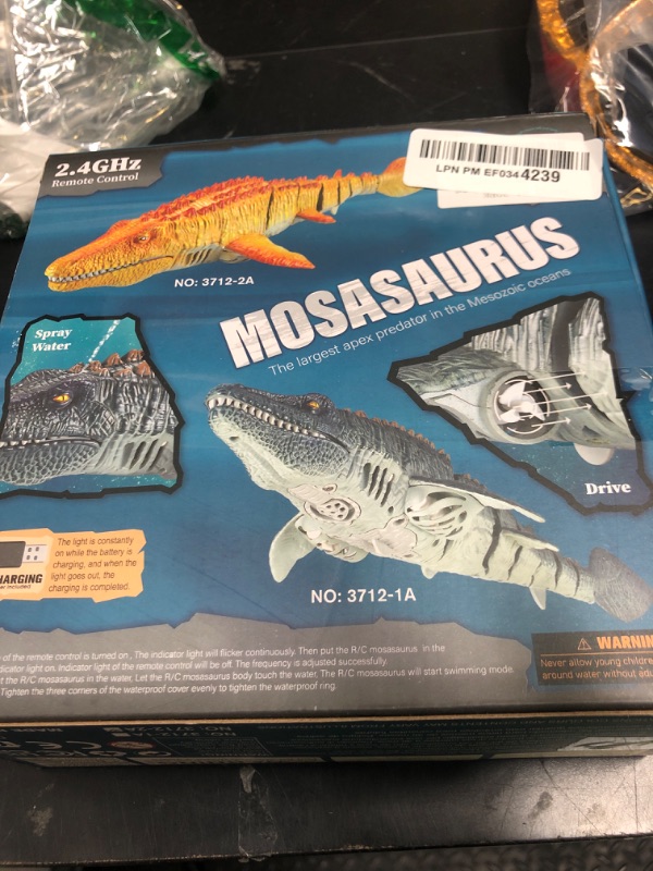 Photo 1 of Dinosaur Pool Toys for Kids 5-7, Mosasaurus Water Dinosaur Toy | 2.4G Remote Control | One-Key Demo RC Dino Boat Shark Pool Diving Bath Toys with Light and Spray Water for Boys Girls