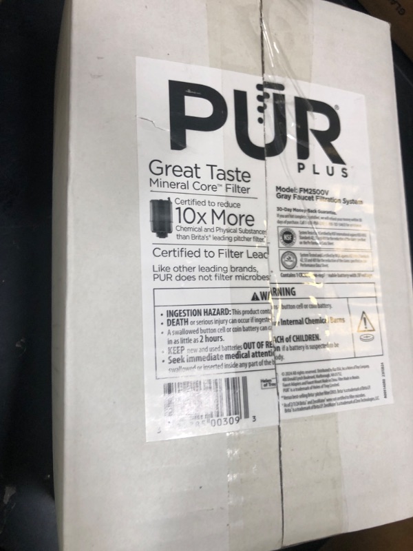Photo 1 of PUR PLUS Vertical Faucet Mount Water Filtration System, Lead-Reducing Filter, Great-Tasting Water, Easy Install, Lasts 100 Gallons, Compatible with Sinks with External Aerators, Grey