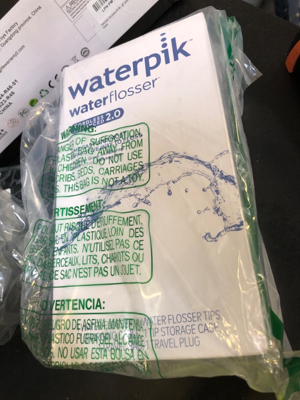 Photo 1 of Waterpik Cordless Advanced 2.0 Water Flosser For Teeth, Gums, Braces, Dental Care With Travel Bag and 4 Tips, ADA Accepted, Rechargeable, Portable, and Waterproof, Gray WP-587, Packaging May Vary