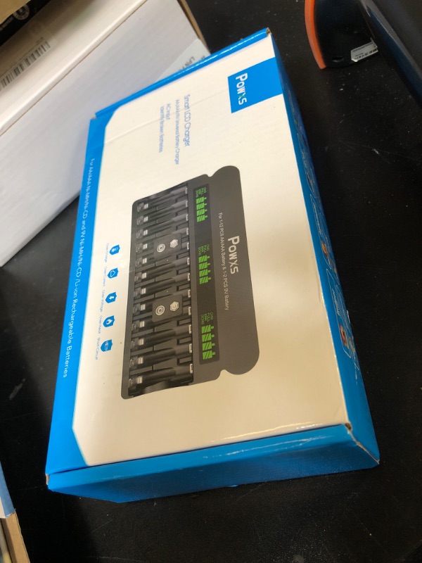 Photo 1 of POWXS Rechargeable AA AAA 9V Battery Charger with 1800mA High-Speed, 12 Bay Independent Battery Charger for 1.2V Ni-MH Ni-CD AA AAA Rechargeable Batteries and 9V Lithium Ion (Include AC Cable)