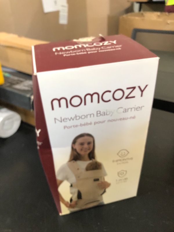 Photo 1 of Momcozy Newborn Baby Carrier - Ergonomic, Cozy and Lightweight Carrier for 7-24lbs, Adjustable Neck Support with Sunshield, Breathable Airmesh Perfect for Summer Outing, Khaki