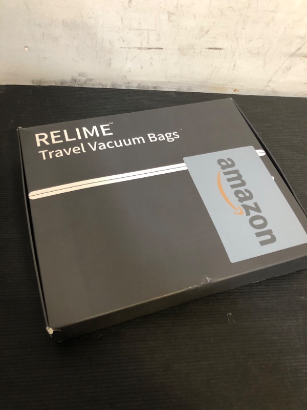 Photo 1 of Relime Vacuum Bags for Travel Luggage, Revolutionary Reusable Compression Bags for Carry On Suitcases and Backpack, Vacuum Seal Packing cube for Cloth Packing (2 PC No Pump)