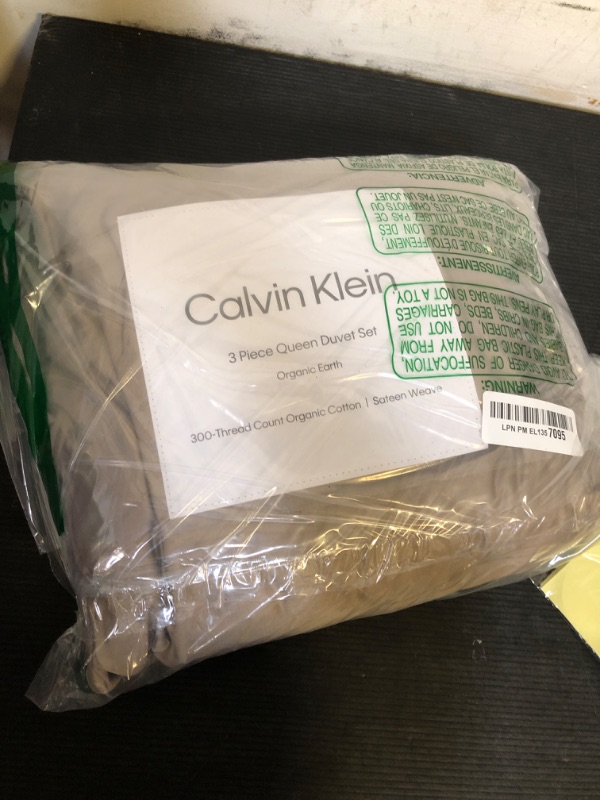 Photo 1 of Calvin Klein - Queen Duvet Cover Set, Organic Cotton Sateen Bedding, Luxuriously Soft Home Decor, GOTS Certified (Organic Earth Mocha Brown, Queen)