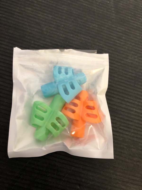 Photo 1 of JuneLsy Pencil Grips for Kids Handwriting Pencil gripper Pencil Holder Posture Correction Training Writing AIDS for preschooler Kids toddler Children Special Needs (3 PCS)