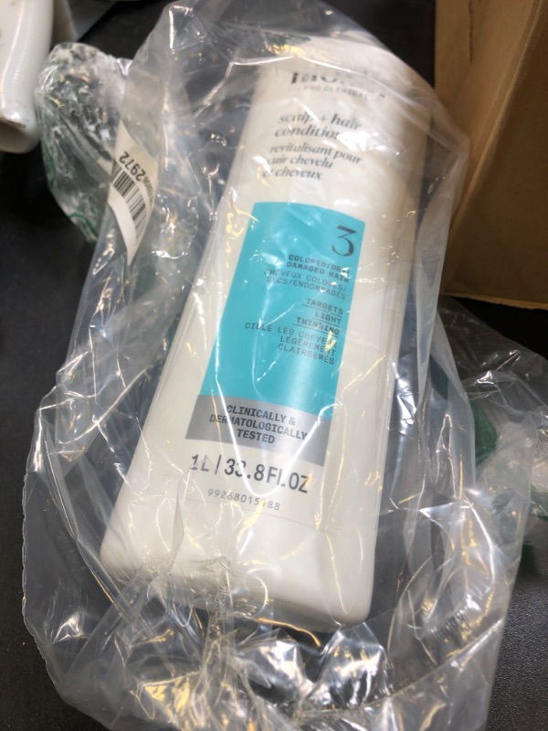 Photo 1 of Nioxin System 3 Scalp + Hair Conditioner | For Colored or Damaged Hair with Light Thinning | With Niacinamide and Biotin | 33.8 Fl oz.