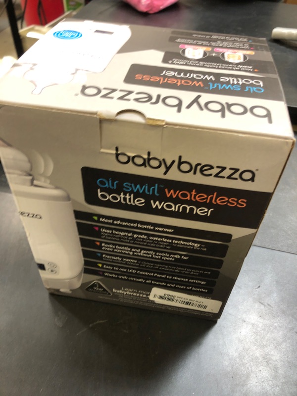 Photo 1 of Baby Brezza AirSwirl Waterless Baby Bottle Warmer - Safely Warm Breastmilk + Formula - Bottles Stay Dry + Nutrients are Protected - Works with Nearly All Bottles