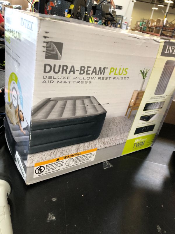Photo 1 of Intex 64131ED Dura-Beam Plus Deluxe Pillow: Fiber-Tech – Twin Size – Built-in Electric Pump – 16.5in Bed Height – 300lb Weight Capacity