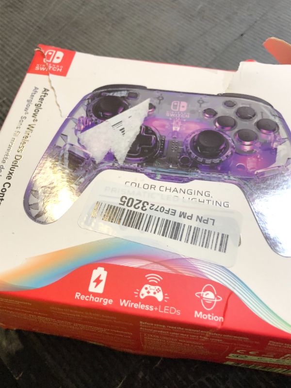 Photo 1 of PDP Gaming Afterglow Wireless Nintendo Switch Pro Controller: Prismatic RGB LED Lighting, Full Motion Control Gamepad, Customizable Paddle Buttons