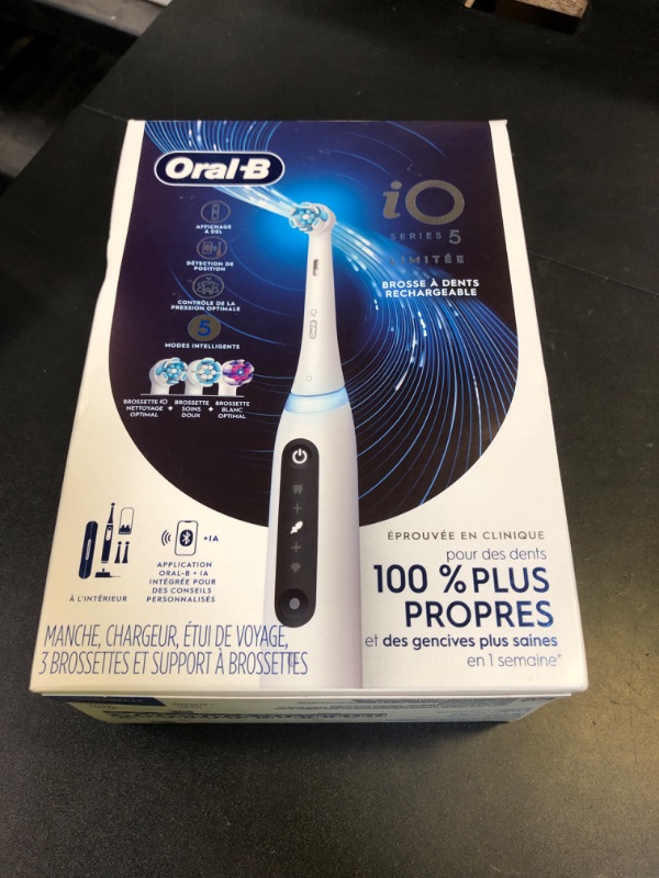 Photo 1 of Oral-B iO Deep Clean + Whiten Rechargeable Electric Toothbrush with Visible Pressure Sensor, 2 Minute Timer, 5 Cleaning Settings, 1 iO5 Limited, 3 Toothbrush Heads, Travel Case & Refill Holder, White