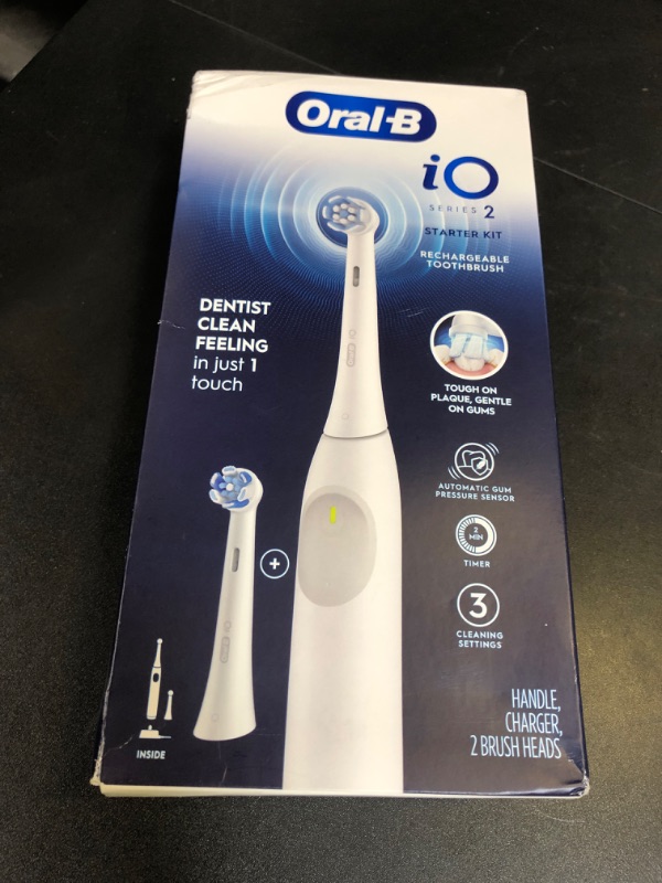 Photo 1 of Oral-B iO Series 2 Rechargeable Electric Powered Toothbrush Starter Kit, Pure White with 2 Brush Heads - Automatic Pressure Sensor to Protect Gums - 3 Modes - 2 Min Timer