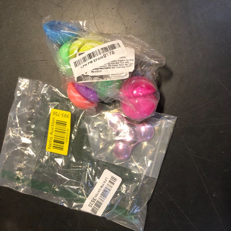 Photo 1 of fidget spinner and poppers fidget toys