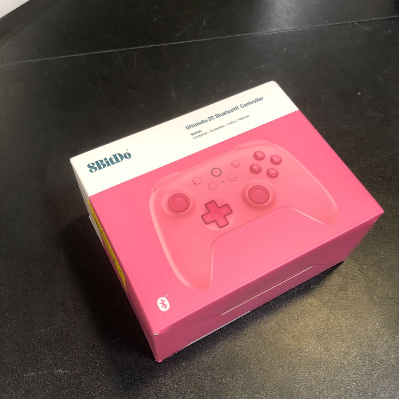 Photo 1 of 8BitDo Ultimate 2C Bluetooth Controller for Switch/Switch 2, Wireless Controller with 6-Axis Motion Control, Rumble Vibration, Refined D-Pad and Bumpers, and Hall Effect Joysticks (Pink)