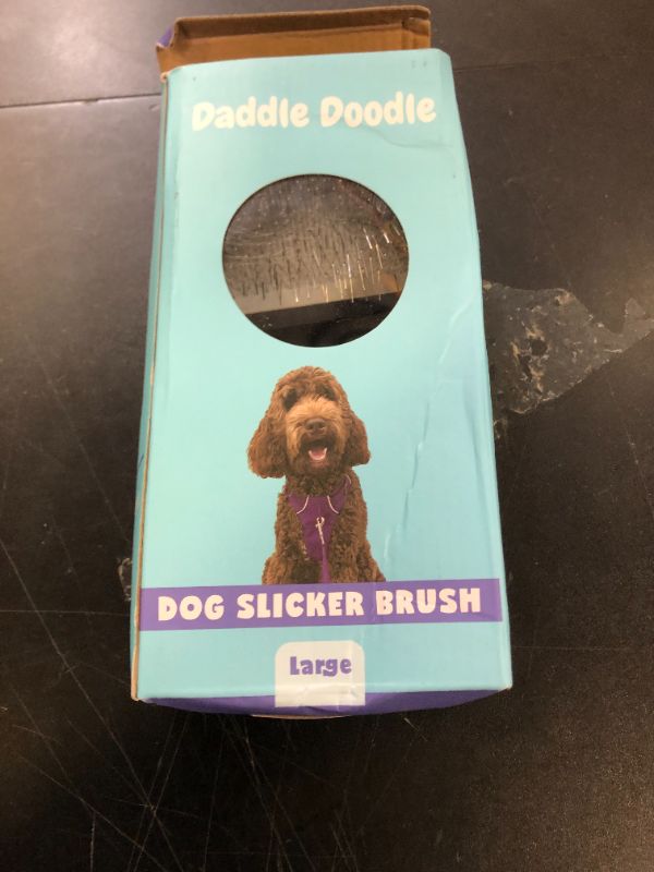Photo 1 of Daddle Doodle Dog Slicker Brush - Dog Grooming Brush Especially Designed for All Poodles and Doodle Mixes – Fluff, Style, Detangle, and Demat – Ergonomic Handle Design – Soft and Angled Brush Pins that are Safe and Effective