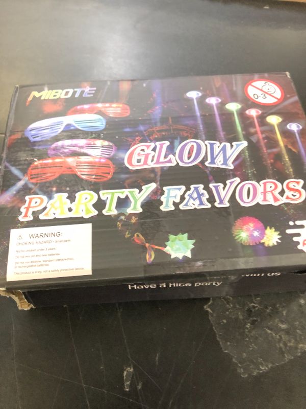Photo 1 of MIBOTE 83Pcs Led Light Up Toys Party Favors Glow in the Dark Party Supplies for Kid/Adults Halloween with 50 Finger Lights, 8 Jelly Rings,Flashing Glasses,Bracelets, Fiber Optic Hair Lights