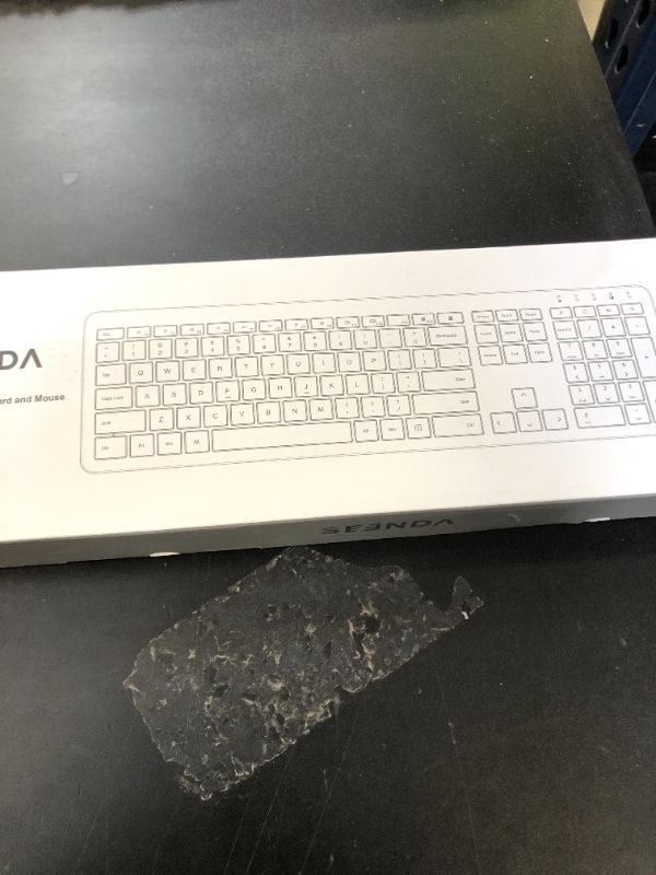Photo 1 of Wireless Keyboard and Mouse Combo - Full Size Slim Thin Wireless Keyboard Mouse with Numeric Keypad 2.4G Stable Connection Adjustable DPI (White & Silver)