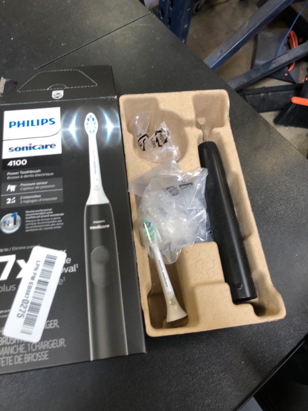 Photo 1 of Philips Sonicare 4100 Rechargeable Electric Toothbrush, with Pressure Sensor, 2 Intensity Settings, SmarTimer and QuadPacer, 14-Day Battery Life, Black, Model HX3681/24