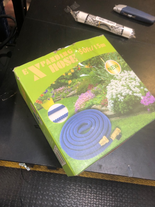 Photo 1 of Expandable Garden Hose 50 ft, 2025 New Flexible Water Hose 50ft with 10 Function Spray Nozzle, 3/4" Leakpoof Solid Brass Fittings, Expanding Double Latex Core, Lightweight, No Kink, No Tangle