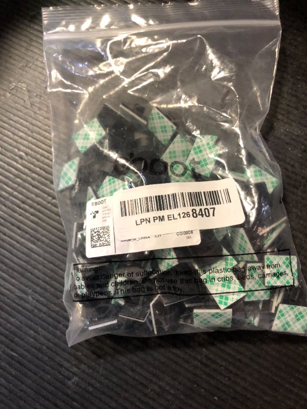 Photo 1 of Eboot 100 Pieces Adhesive Cable Wire Clips Strong Cord Clips Wire Holders Cable Staples Management Clamps Tie Holder for The Wall, Under Desk, Car, Office and Home