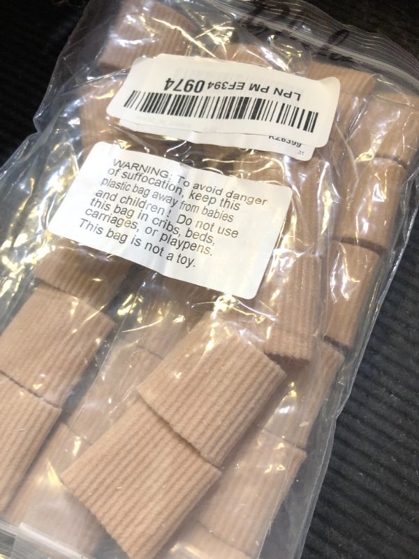 Photo 1 of Blulu 24 Pieces Toe Tubes 0.98 Inches Cushion Tube Corn Pads for Toes Sleeves Soft Gel Protectors for Cushions Corns Blisters Calluses 3 Size(Skin Color,Medium Size)