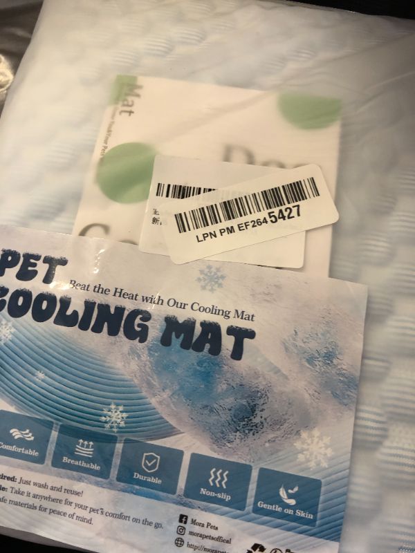 Photo 1 of Mora Pets Dog Cooling Mat Breathable Cooling Pad for Dog Cats Washable Pet Cooling Mat for Indoor Outdoor Pets with Non-Slip Bottom 28 x 22 inch Light Blue Small