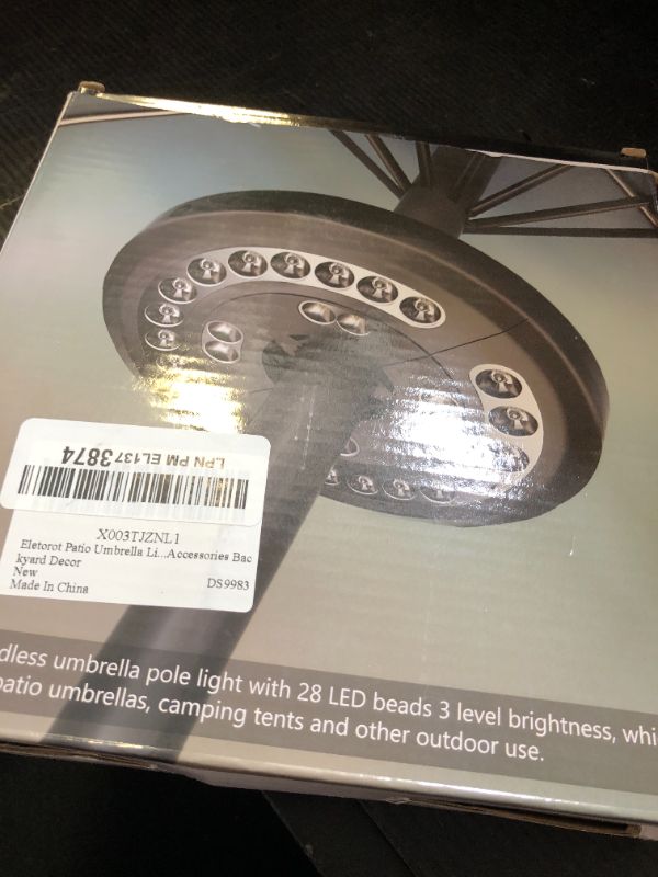 Photo 1 of Eletorot Patio Umbrella Lights-Rechargeable Outdoor Lights for Decor, Table Light 28 LED 3 Lighting Modes, Cool Patio Pool Accessories Backyard Decor