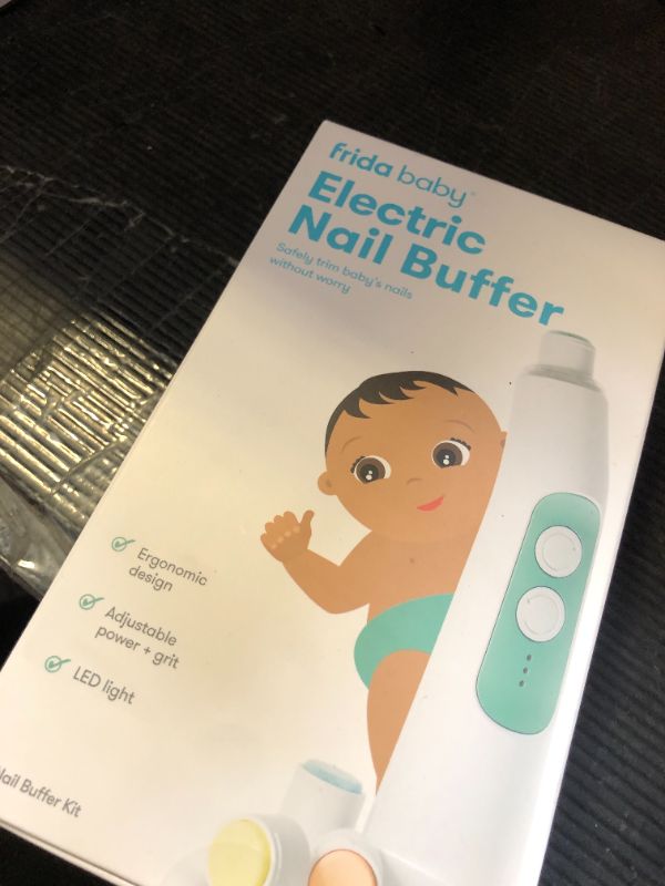 Photo 1 of Frida Baby Electric Nail Trimmer, Safe + Easy Electric Nail File Baby Nail Clipper + Nail Trimmer Kit for Newborn, Toddler, or Children's Fingernails/Toenails, 4 Buffer Pads, LED Light, Storage Case