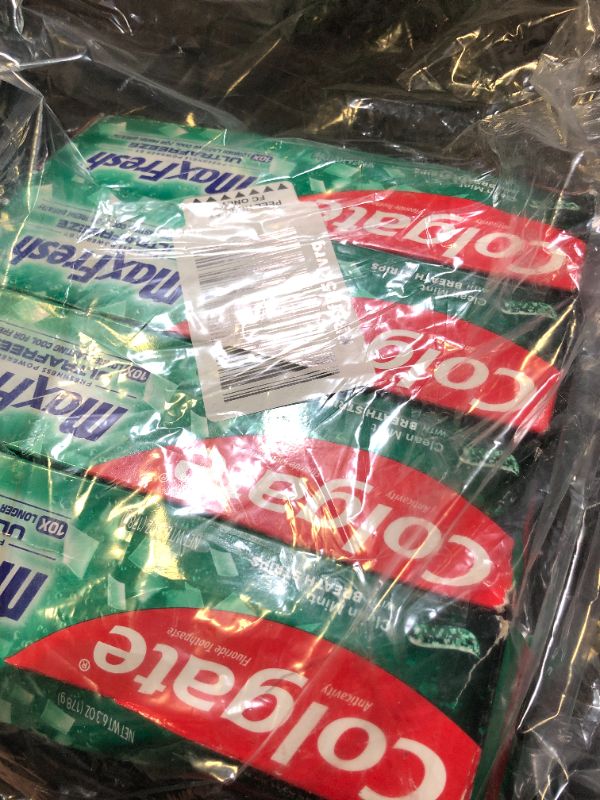 Photo 1 of Colgate Max Fresh Whitening Toothpaste with Mini Strips, Clean Mint Toothpaste for Bad Breath, Helps Fight Cavities, Whitens Teeth, and Freshens Breath, 6.3 Ounce (Pack of 4)