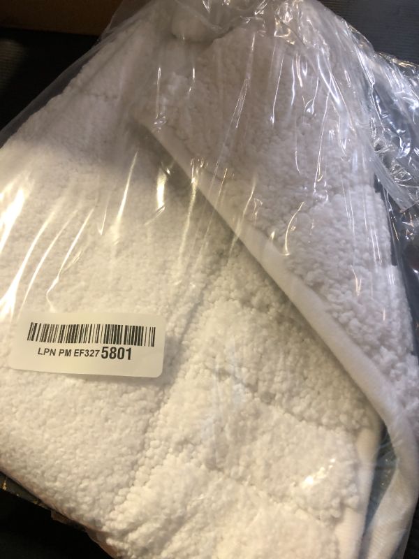 Photo 1 of Disolla Small Bathroom Rugs 17x24 Non Slip White Fluffy Bath Mat for Bathroom Floor Machine Washable Plush Luxury Bath Rug for Tub Soft Shaggy Absorbent Shower Mat