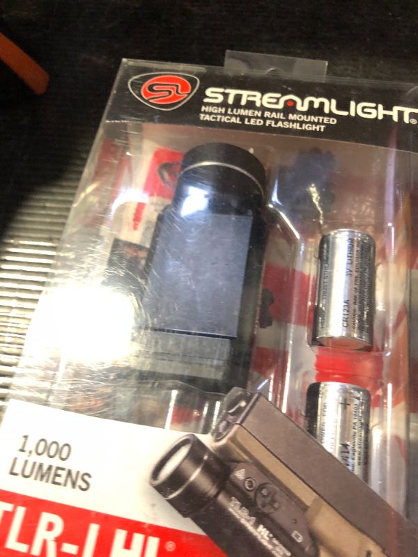 Photo 1 of Streamlight 69260 TLR-1 HL 1000-Lumen Rail Mounted Strobing Tactical Weapon Light with Rail Locating Keys and Lithium Batteries, Black