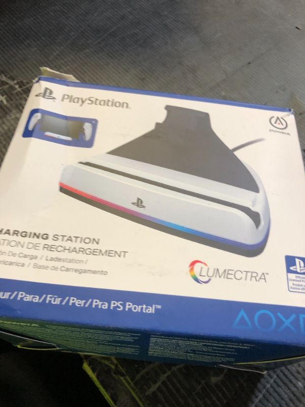 Photo 1 of PowerA Charging Station for PlayStation Portal™ Remote Player with Lumectra™, RGB Lighting, USB Powered, Magnetic Charger, Charge and Display, Weighted Base, Officially Licensed