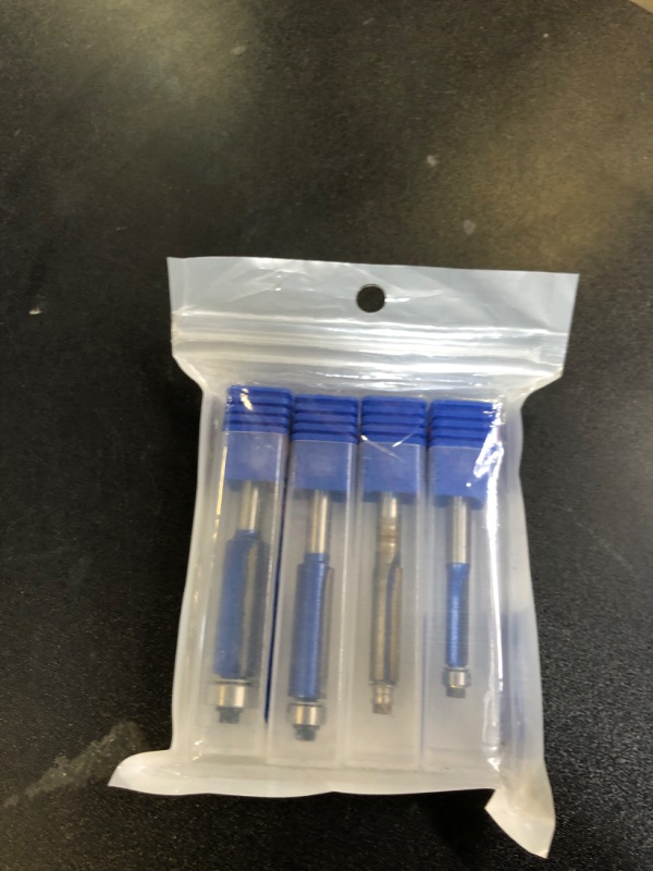 Photo 1 of Wolfride 4PCS Flush Trim Router Bit Set 1/4 Inch Shank Top Bearing Flush Trim Router Bit