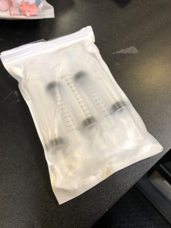 Photo 1 of Wisdom Teeth Syringe, 5 Pack Irrigation Dental Syringes with Measure Scale & Curved Tip for Dental Care Liquid Oral Tonsil Stone