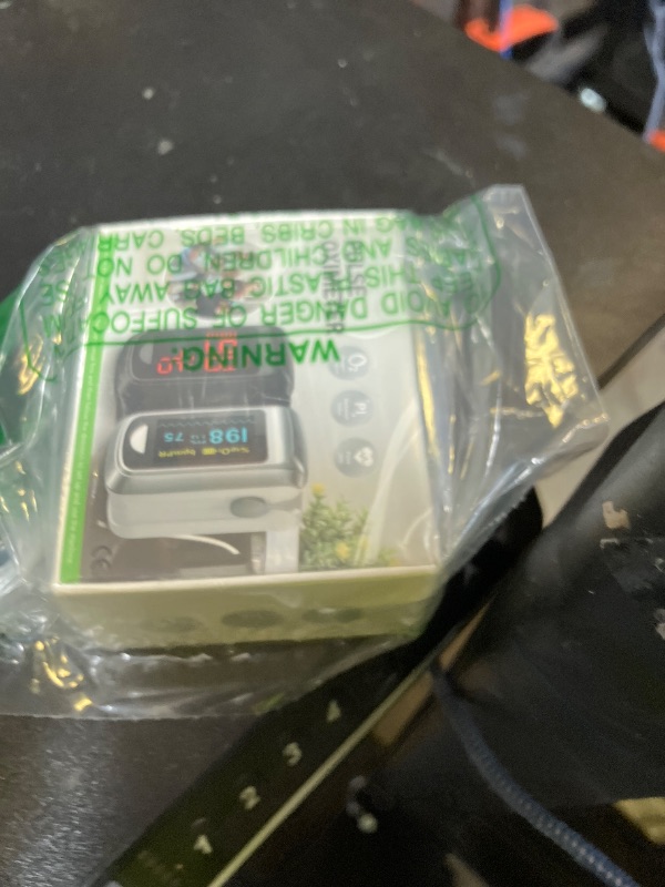 Photo 1 of Fingertip Pulse Oximeter Blood Oxygen Saturation Monitor Pulse Ox, Heart Rate and Fast Spo2 Reading Oxygen Meter with OLED Screen Included Lanyard and 2 X AAA Batteries