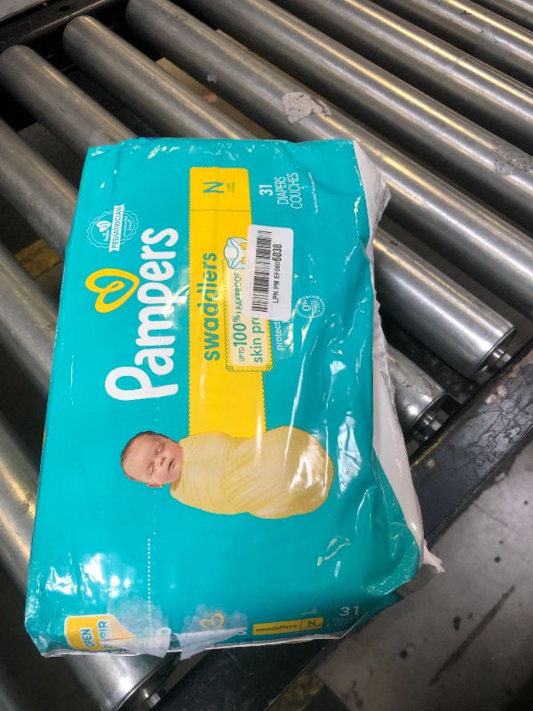 Photo 1 of Pampers Baby Diapers - Swaddlers - Size 0, 31 Count, Ultra Absorbent Disposable Newborn Diaper