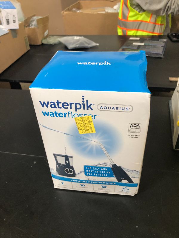 Photo 1 of Waterpik Aquarius Water Flosser For Teeth Cleaning, Gums, Braces, Dental Care, Electric Power With 10 Settings, 7 Tips For Multiple Users And Needs, ADA Accepted, Blue WP-663, Packaging May Vary