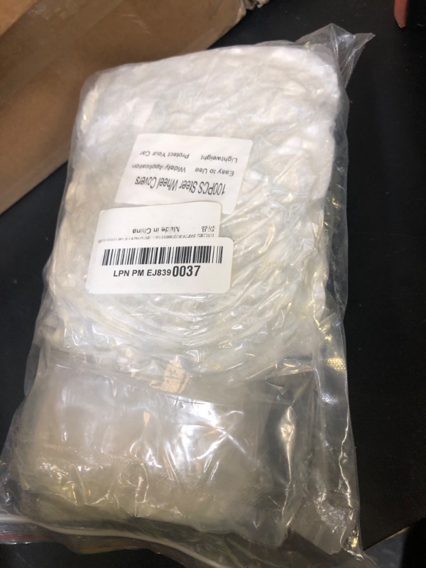 Photo 1 of ICWEIMEI 300Pcs Disposable Car Protective Covers Include 100Pcs Disposable Steering Wheel Covers 100Pcs Disposable Gear Shift Covers 100Pcs Disposable Handbrake Covers for Car Protection