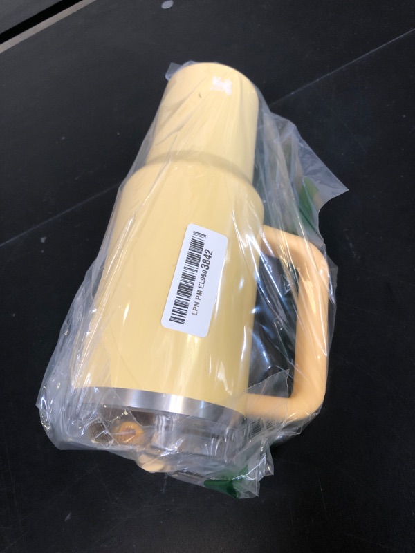 Photo 1 of Stanley Quencher ProTour Flip Straw Tumbler with Leakproof Lid 40 oz | Built-In Straw and Handle | Cup Holder Compatible for Travel | Insulated Stainless Steel Cup | BPA-Free | Butter Gloss