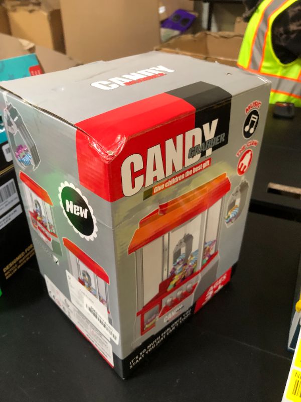 Photo 1 of Claw Machine for Kids Toy Mini Claw Machine Candy Grabber Prize Dispenser Vending Machine Arcade Game Machines for Home Party Christmas Birthday Gifts Cool Girl Toys