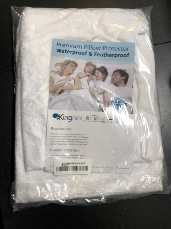 Photo 1 of Kingnex 4 Pack Feather Proof Pillow Protectors with Zipper Standard Size - Waterproof - Down Proof - Bamboo Viscose Terry Surface