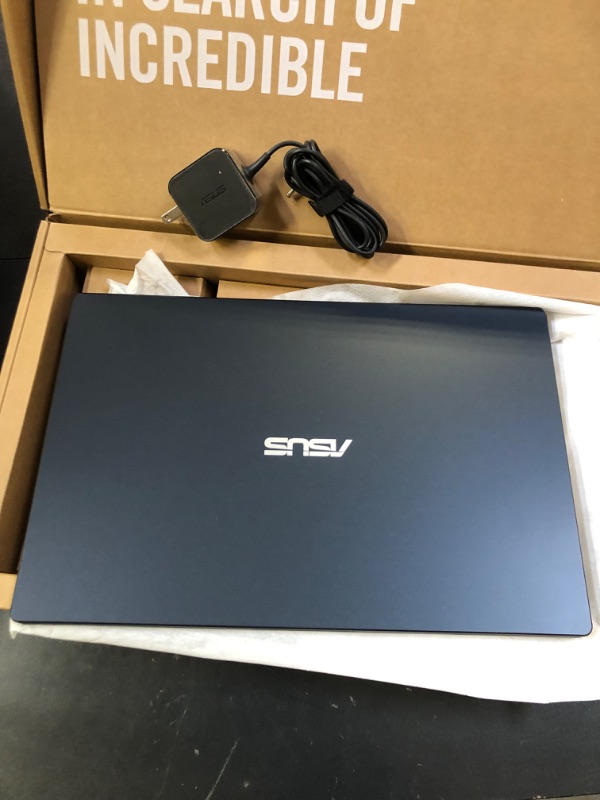 Photo 1 of Asus E410 Intel Celeron N4020 4GB 64GB 14-Inch HD LED Win 10 Laptop (Star Black) (Renewed)