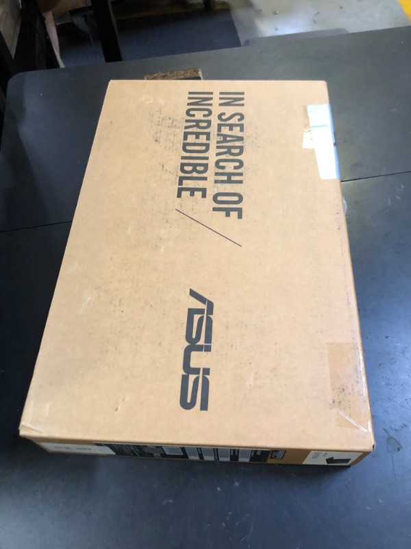 Photo 1 of Asus E410 Intel Celeron N4020 4GB 64GB 14-Inch HD LED Win 10 Laptop (Star Black) (Renewed)