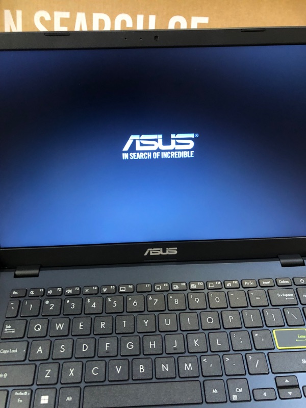 Photo 1 of Asus E410 Intel Celeron N4020 4GB 64GB 14-Inch HD LED Win 10 Laptop (Star Black) (Renewed)