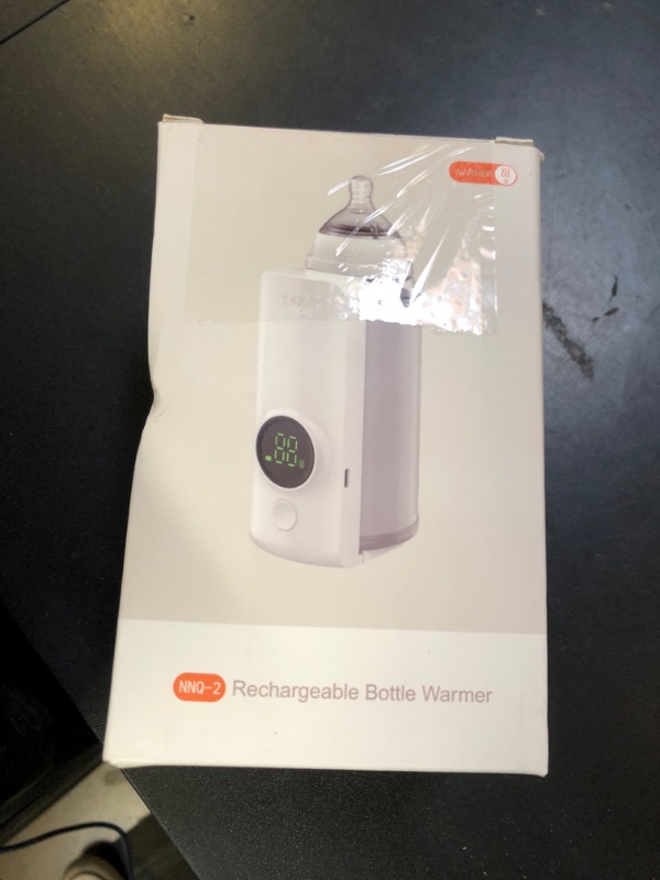 Photo 1 of Portable Bottle Warmer for Travel, Rapid Warming with Battery-Powered Temperature Display, Waterless Milk Warming for Comfortable Baby Feeding On The Go
