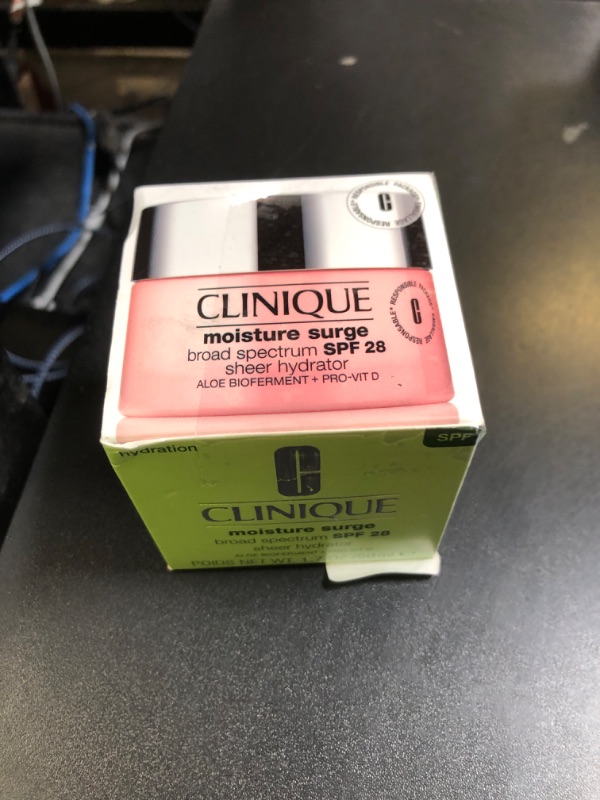 Photo 1 of Clinique Moisture Surge Broad Spectrum SPF 28 Sheer Hydrator Face Moisturizer With Hyaluronic Acid, Aloe Bioferment + Provitamin D | Hydrating + Protecting, 1.7 Ounce