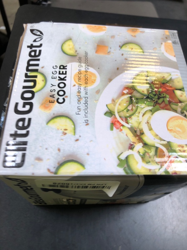 Photo 1 of Elite Gourmet EGC-508 Rapid Egg Cooker, 7 Easy-To-Peel, Hard, Medium, Soft Boiled Eggs, Poacher, Omelet Maker, Auto Shut-Off, Alarm, 16-Recipe Booklet, Stainless Steel