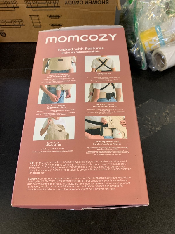 Photo 1 of Momcozy Newborn Carrier WeeSnug- Lightweight and Cozy Comfort for 7-25 lbs, Ergonomic Cross-Back Support, Effortless to Put On, Hands-Free Baby Carrier with Lumbar Support, Khaki