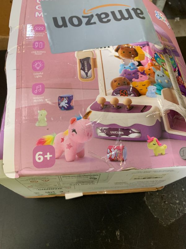 Photo 1 of Skirfy Large Claw Machines for Kids,Unicorns Toys for Girls Age 6+,Candy Dispenser Arcade Games Mini Vending Toy with Slap Bracelet,Claw Game,Birthday Gifts for Kid Ages 6,7,8,9,10,11,12